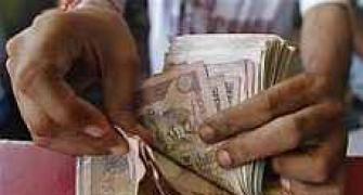 Rupee down 6 paise vs USD at 55.34 in volatile trade