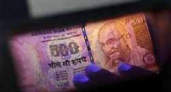Rupee down 30 paise against dollar in late morning trade