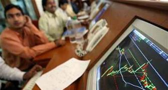 Sensex sluggish; power, oil trade lower