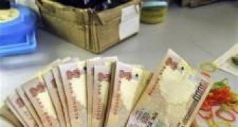 Rupee ends 7 paise down vs. dollar at 54.21