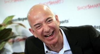 Tax rules could force Bezos to play active role at WaPo
