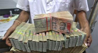 Rupee drops 34 paise to one-week low at 66.48 against USD