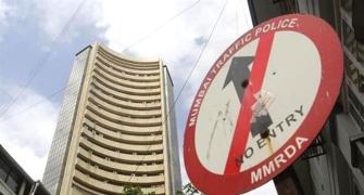 Sensex plunges to two-week low on global cues
