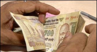 Rupee down 5 paise against USD in morning trade