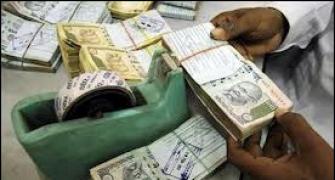 Rupee up by 24 paise vs dollar in late morning trade