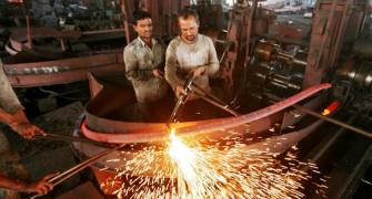 Industrial output rebounds to 2.5%, grows a tad 1%