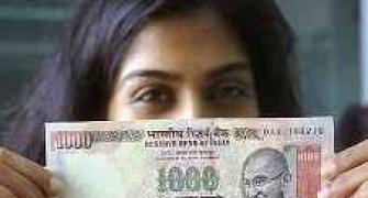 Rupee slips to 1-week low; down 9 paise