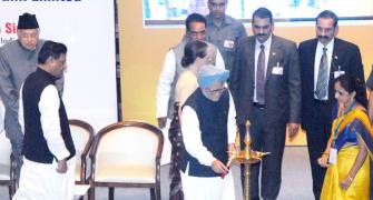 PM inaugurates Bharatiya Mahila Bank, Sonia attends function