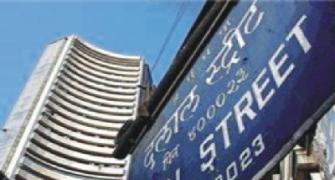 Sensex slips 383 points on repo rate hike