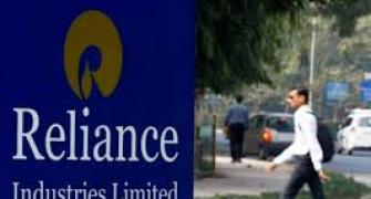 Fitch revises RIL's rating upward to 'stable'