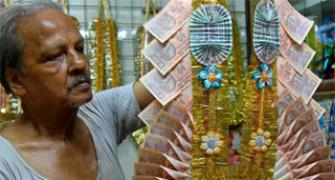 Rupee posts biggest day fall in 13 months