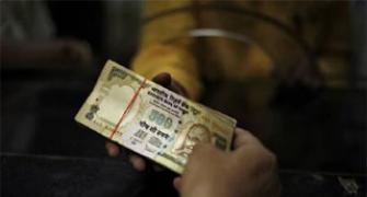 Rupee up 7 paise vs dollar in late morning trade
