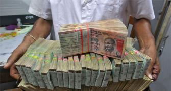 Rupee gains as trade gap shrink