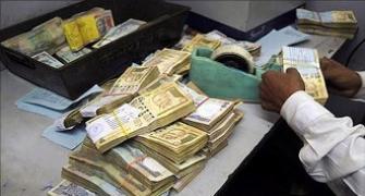 Rupee falls 13 paise as inflation rises