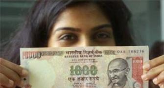 Rupee at near 10-month closing high; RBI remains active