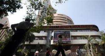 Sensex hits new record; gains over 300 points