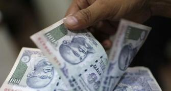 Rupee at 11-month high vs dollar