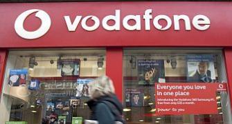 Vodafone Group may sell stake in Bharti to comply with rules