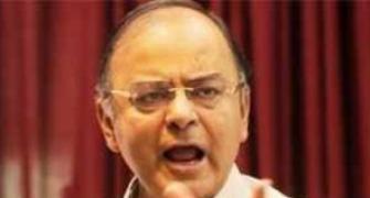 Disclosure of black money a/c holders will embarrass Cong: FM