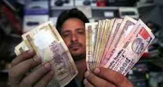 Rupee rises 8 paise to end at 60.84 versus dollar
