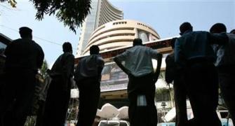 Sensex slips into red;  RIL Q4 nos eyed