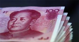 Yuan devaluation to hit firms with foreign loan exposure