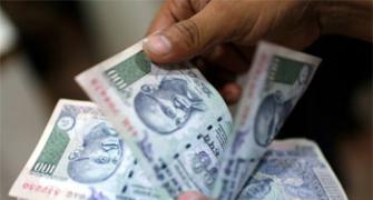 Rupee snaps 2-day gains vs dollar