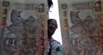 Rupee ends stronger tracking shares, stronger FIIs
