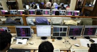 Sensex ends in red, Nifty at new closing high; bank stocks shine
