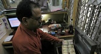 Rajan links more easing to lower bank rates, inflation