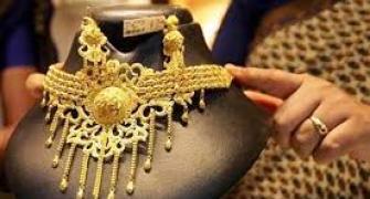 Gold, silver extend losses on global cues, sluggish demand