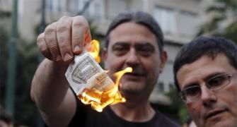 Greece imposes capital controls as crisis deepens