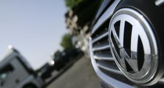 Volkswagen says 11 million cars hit by scandal, probes multiply