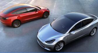In Tesla, electric car makers find a spark