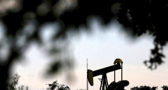 Oil's slide below $30 sends shockwaves far and wide