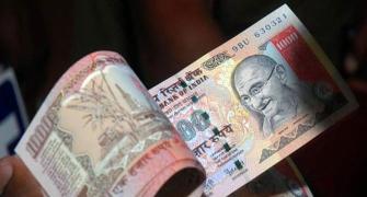 Rupee snaps 3-day winning spree, down 6 paise to 67.11