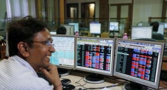 Markets end at record highs on govt's booster dose