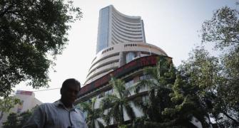 Sensex, Nifty end flat in volatile trade