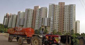 Why NRIs are so gung-ho about buying property in India
