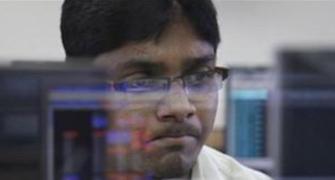 Sensex tanks over 450 points; power, metal stocks sink