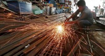 Industrial production slips to 18-month low