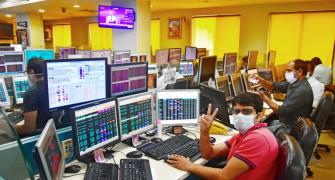 IT, banking, FMCG shrs lift Sensex, Nifty by almost 1%