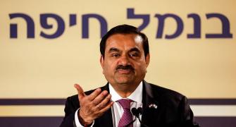 Adani says will complete infra projects on time