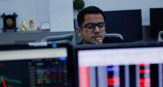 Losses in blue-chip stocks drag markets down