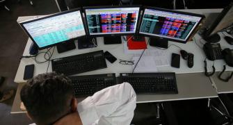 Sensex, Nifty pare gains; end in red