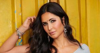 Will Katrina's father attend her wedding?