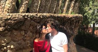 Who is Shriya Saran kissing?