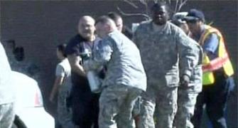 America reacts with shock, grief at army shootout