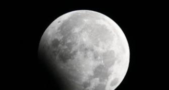 Partial lunar eclipse in the night sky