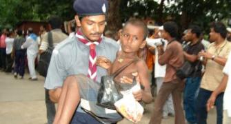 Image: 8-year-old rescued from train accident site